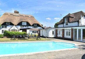 Beautiful Thatched Cottage with Outdoor Pool, Secure Garden, Dog & Family Friendly! Chichester Holiday Properties